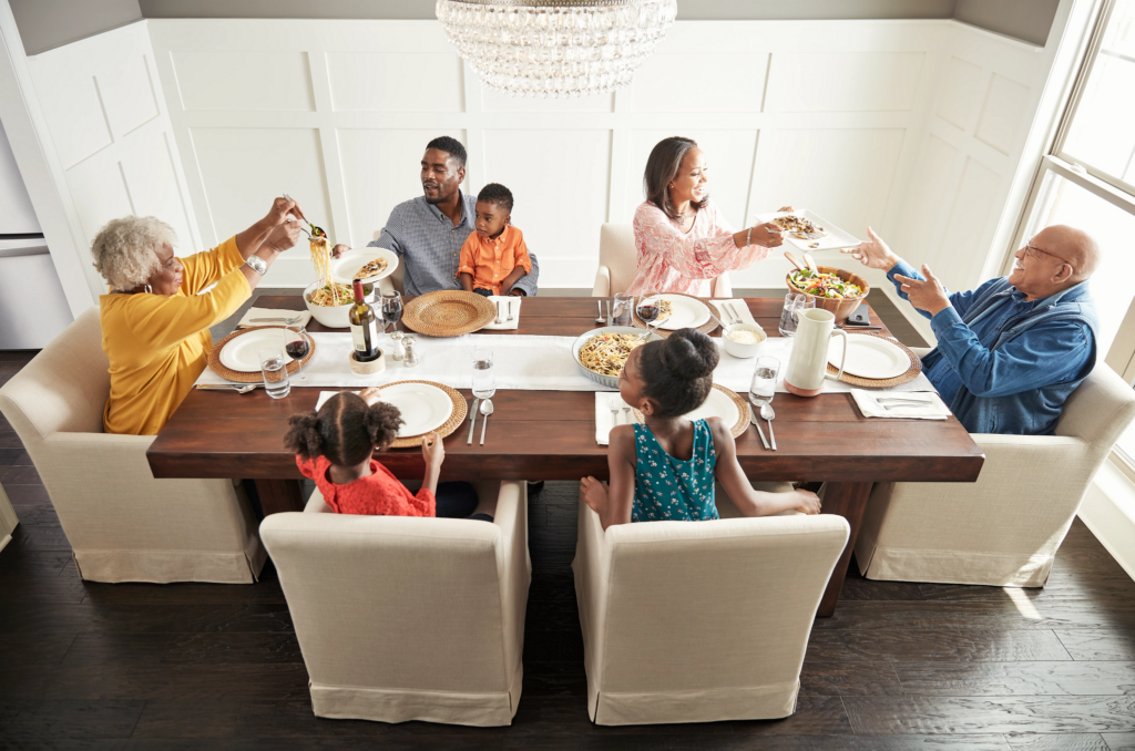 Happy family enjoying break fast | Kirkland's Flooring