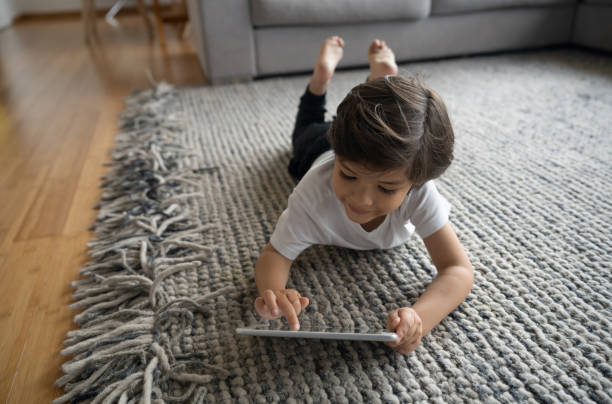 Girl lying on rug | Kirkland's Flooring