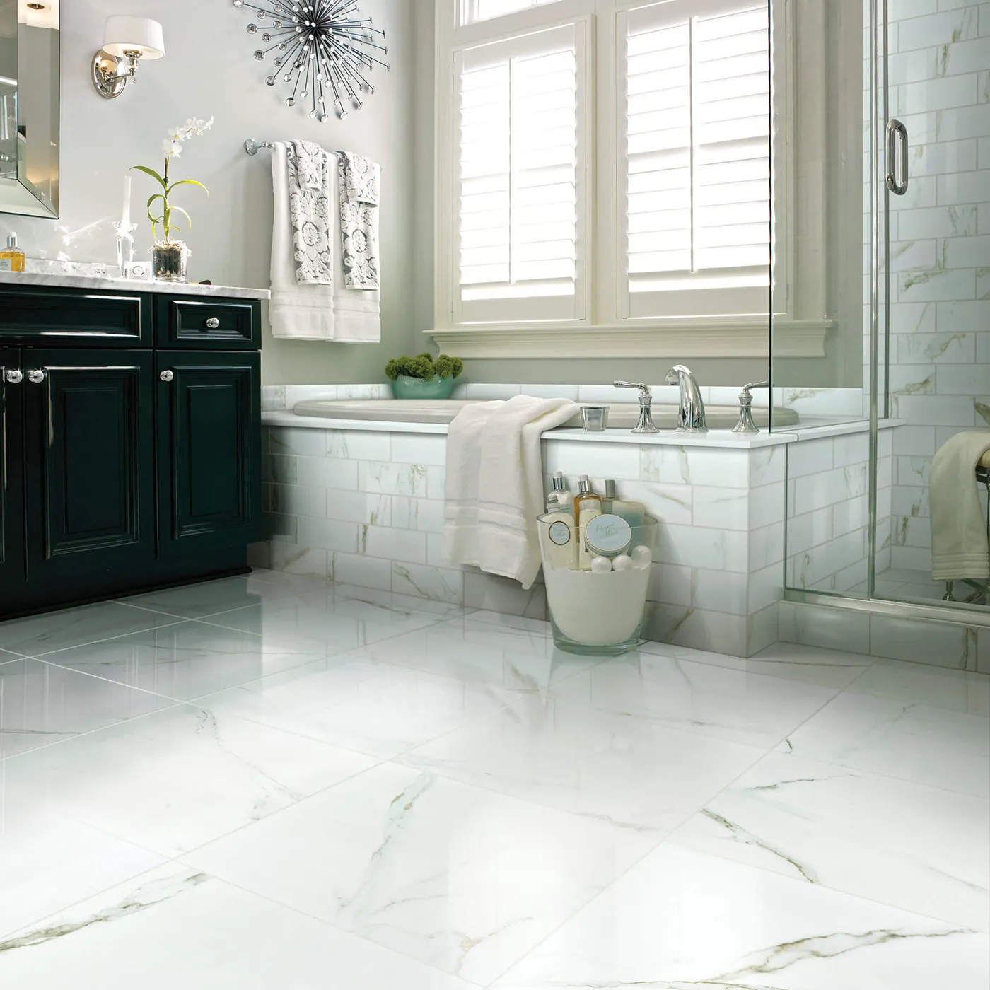 Shaw Floors Calacatta Oro polished white marble-look tile in a luxurious bathroom | Kirkland's Flooring
