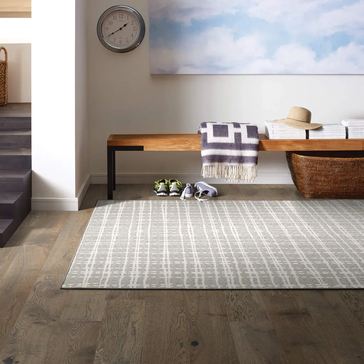 A light-colored Shaw Floors area rug | Kirkland's Flooring