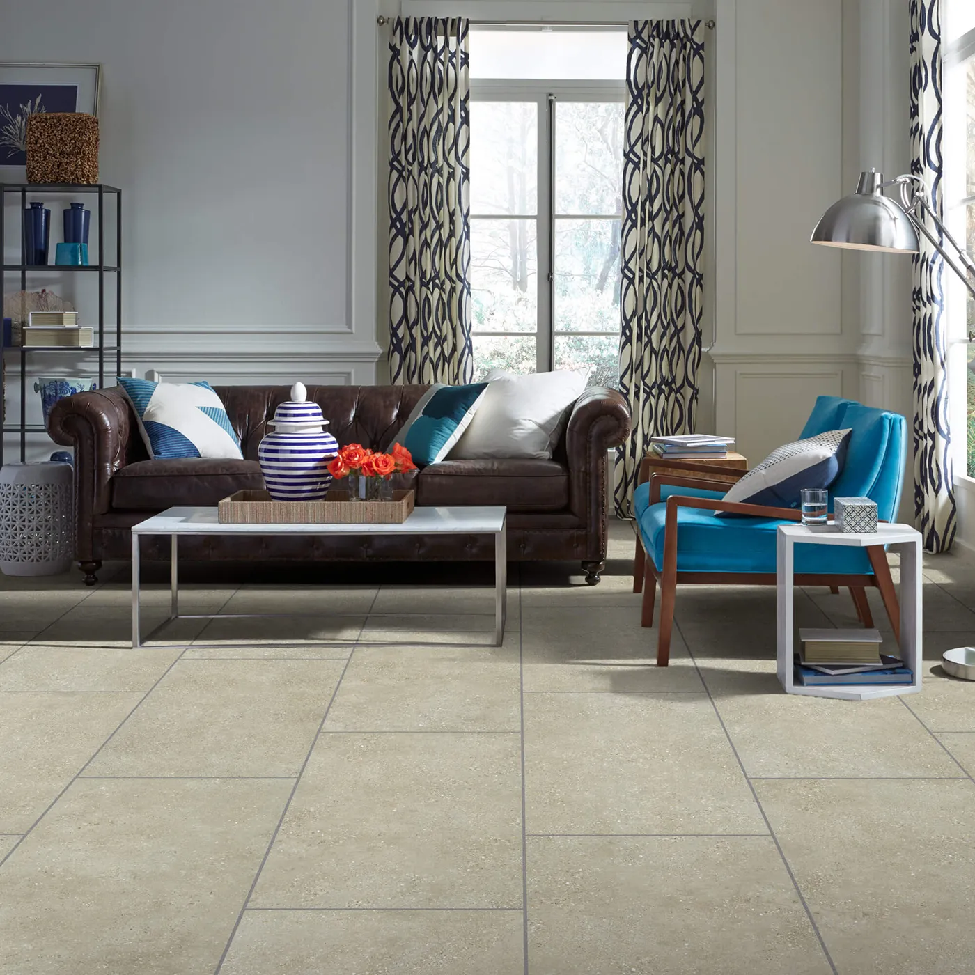 Shaw Floors tile in a light beige cafe color, in a living room | Kirkland's Flooring