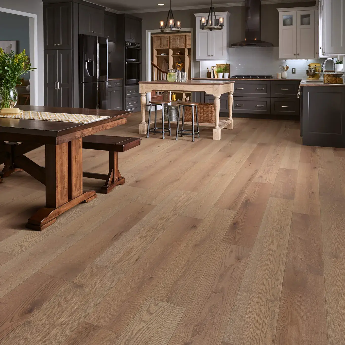 Shaw Floors hardwood in a light brown color in a kitchen | Kirkland's Flooring